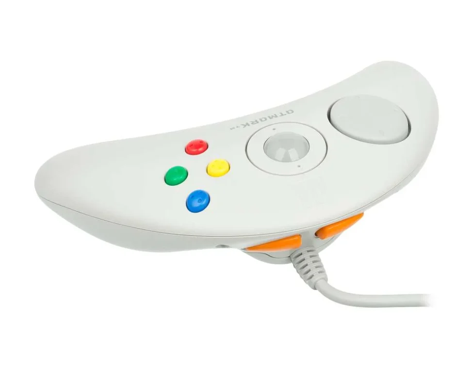 Sim, sim, futurista, cyberpunk, muito doido, era controle, mouse, bumerangue e sabe-se lá  o que mais.
Este é o controle do Pippin